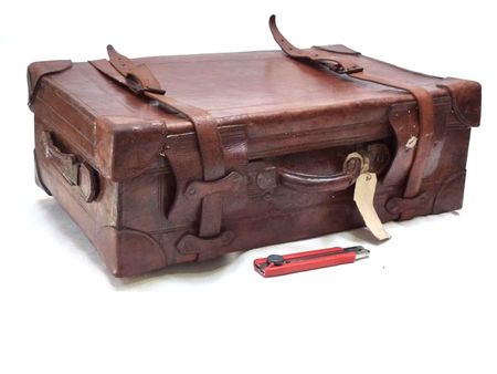 vintage leather suitcase with straps